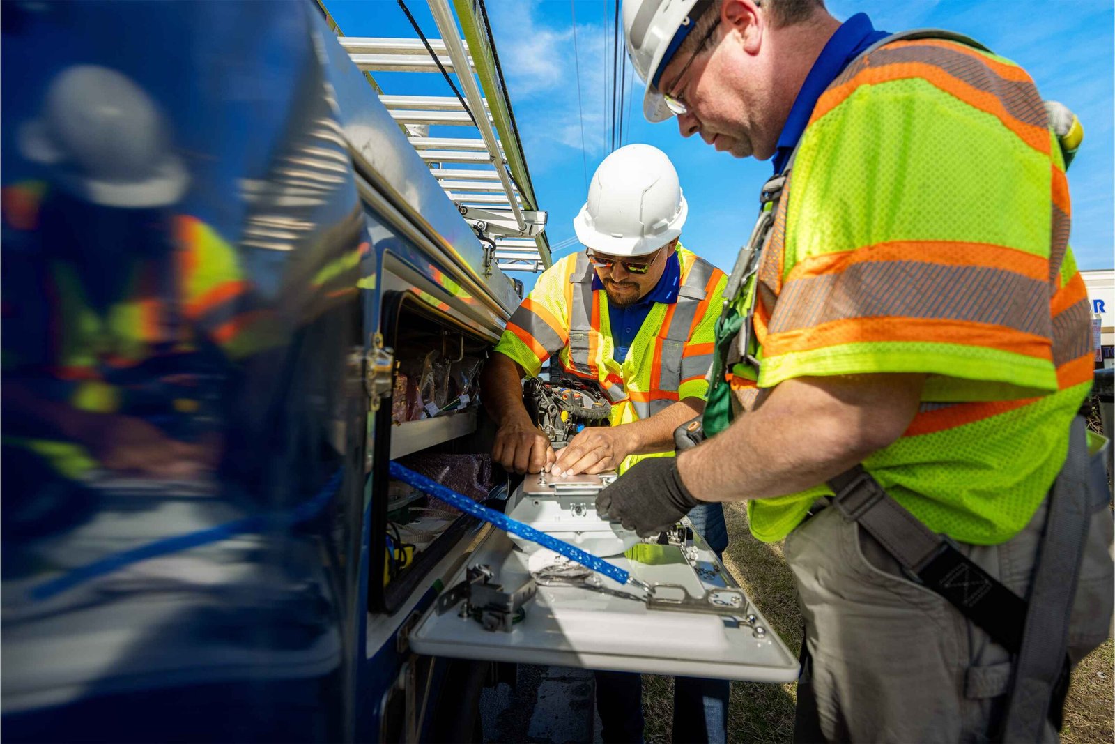 spectrum worker doing work on van